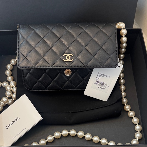 CHANEL Handbags - Chanel Black Quilted Caviar Wallet on Chain